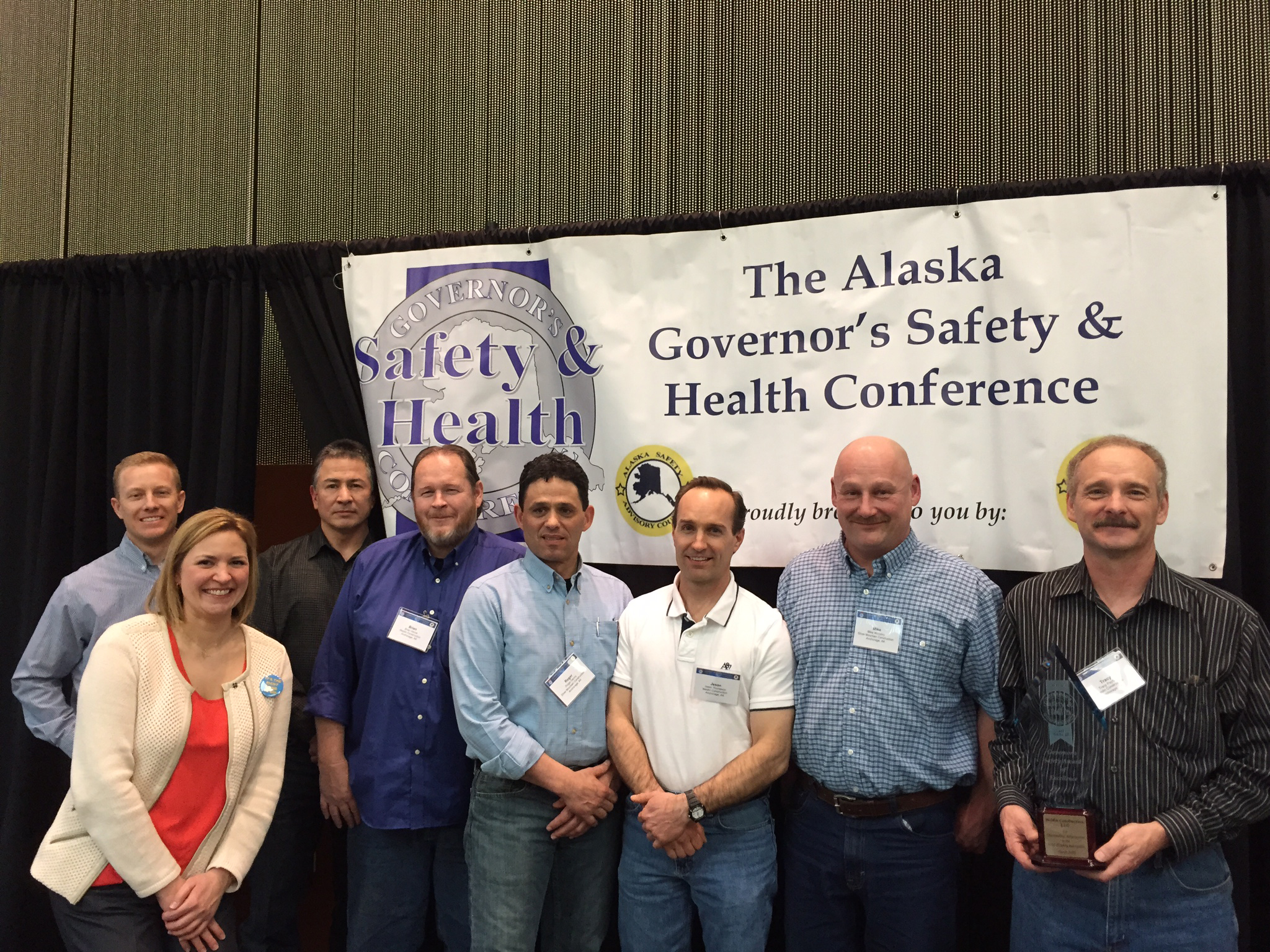 Representatives from Weldin Construction and Silver Mountain Construction each accepted a Governor’s Safety Award of Excellence, presented by Alaska Commissioner of Labor and Workforce Development Heidi Drygas. Photo by Bruce Anders. 