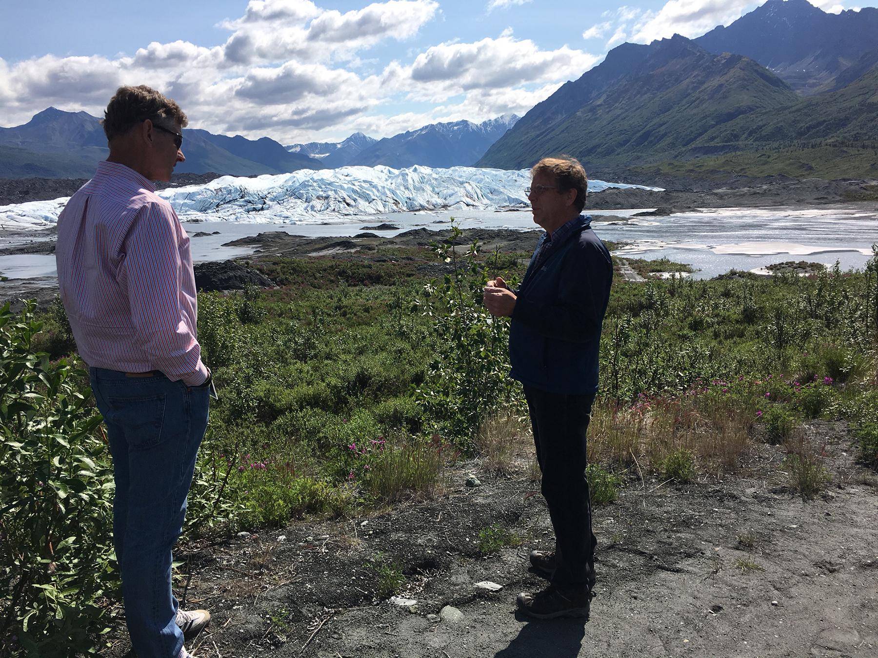 CIRI’s Jason Moore, senior director, Corporate Affairs, chats with Matanuska Glacier Park caretaker and guide Bill Stevenson. Photo by Carly Stuart.
